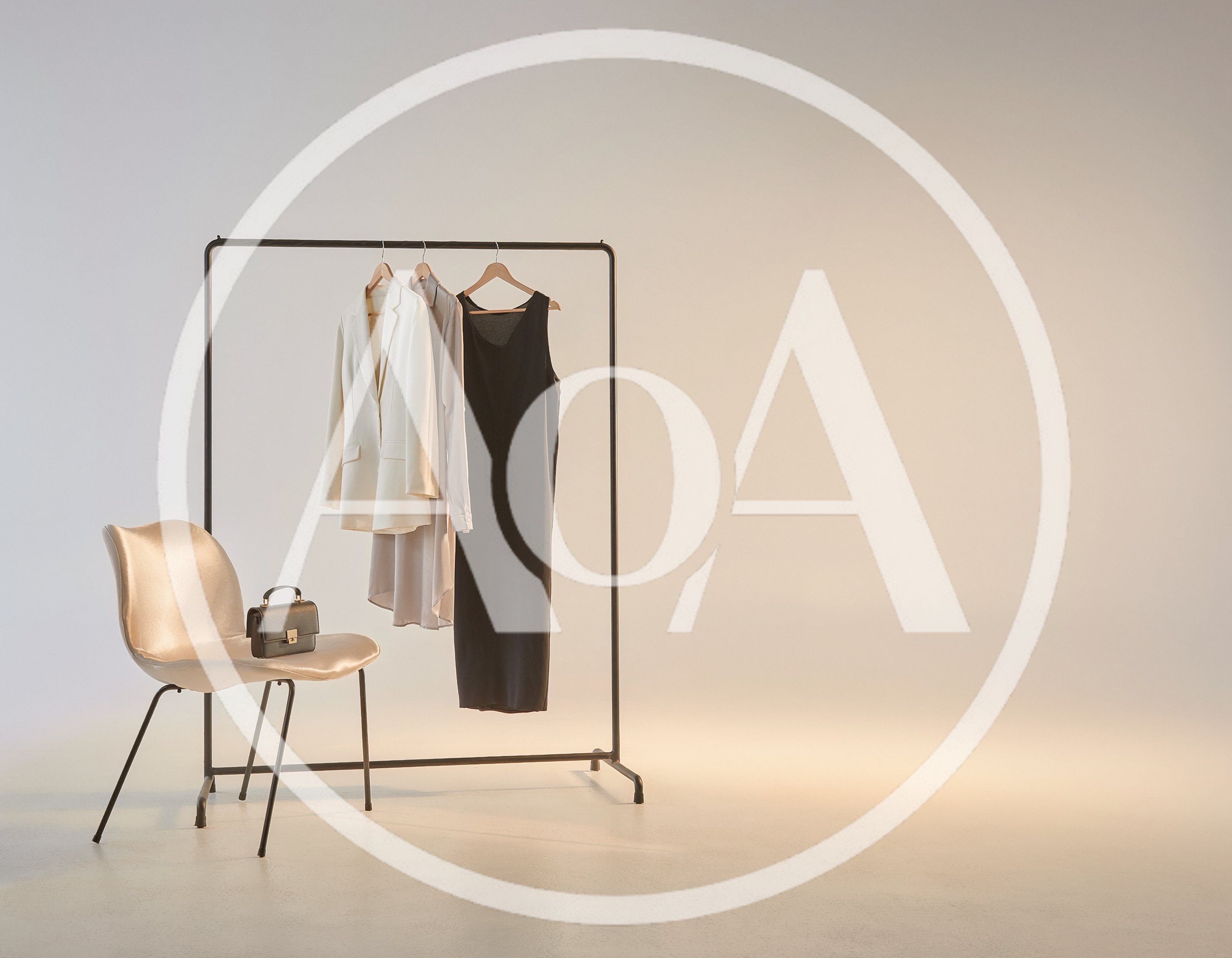 Minimalist Clothing Rack With Garments And Handbag