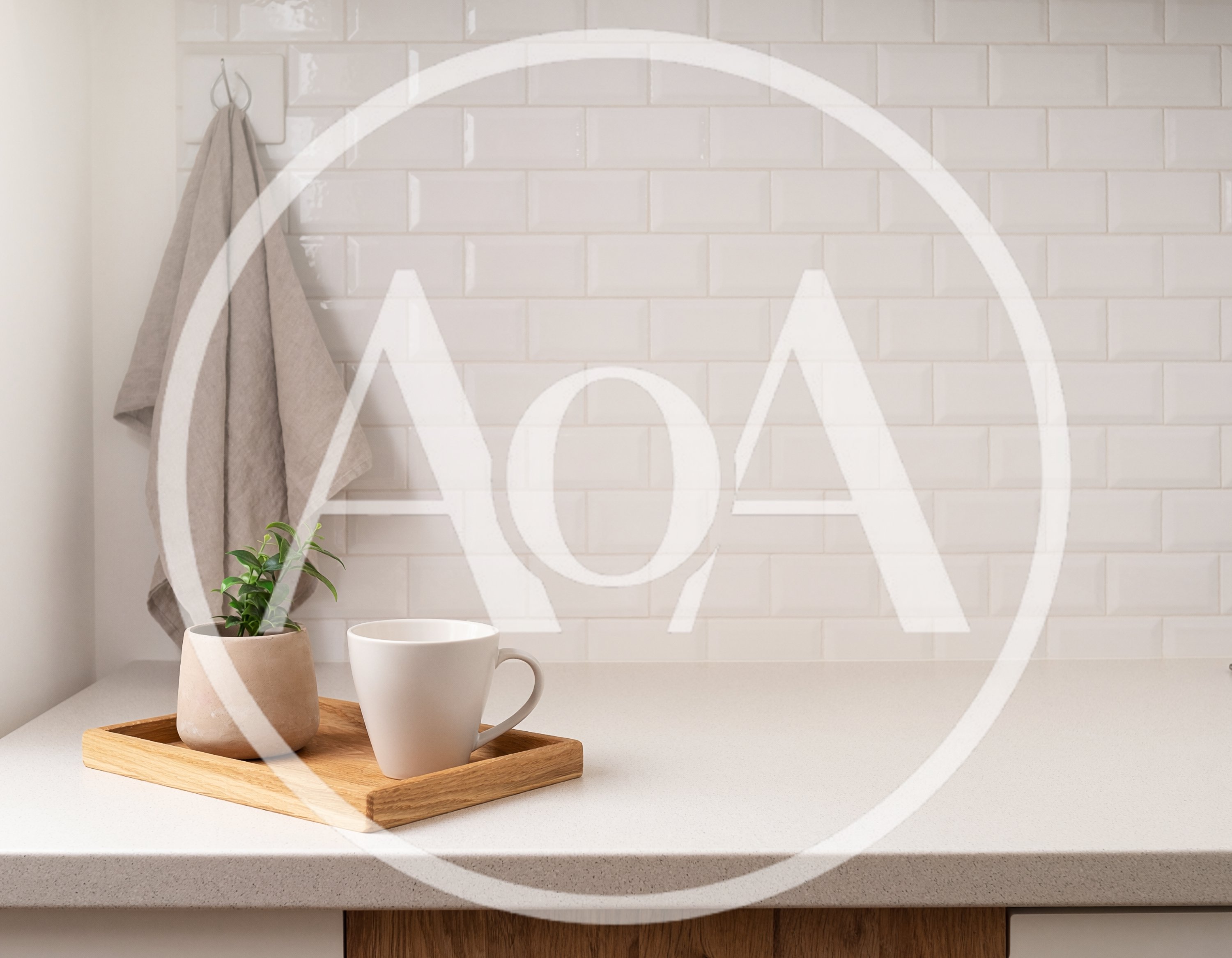 Minimalist Kitchen Countertop With Coffee Mug And Plant