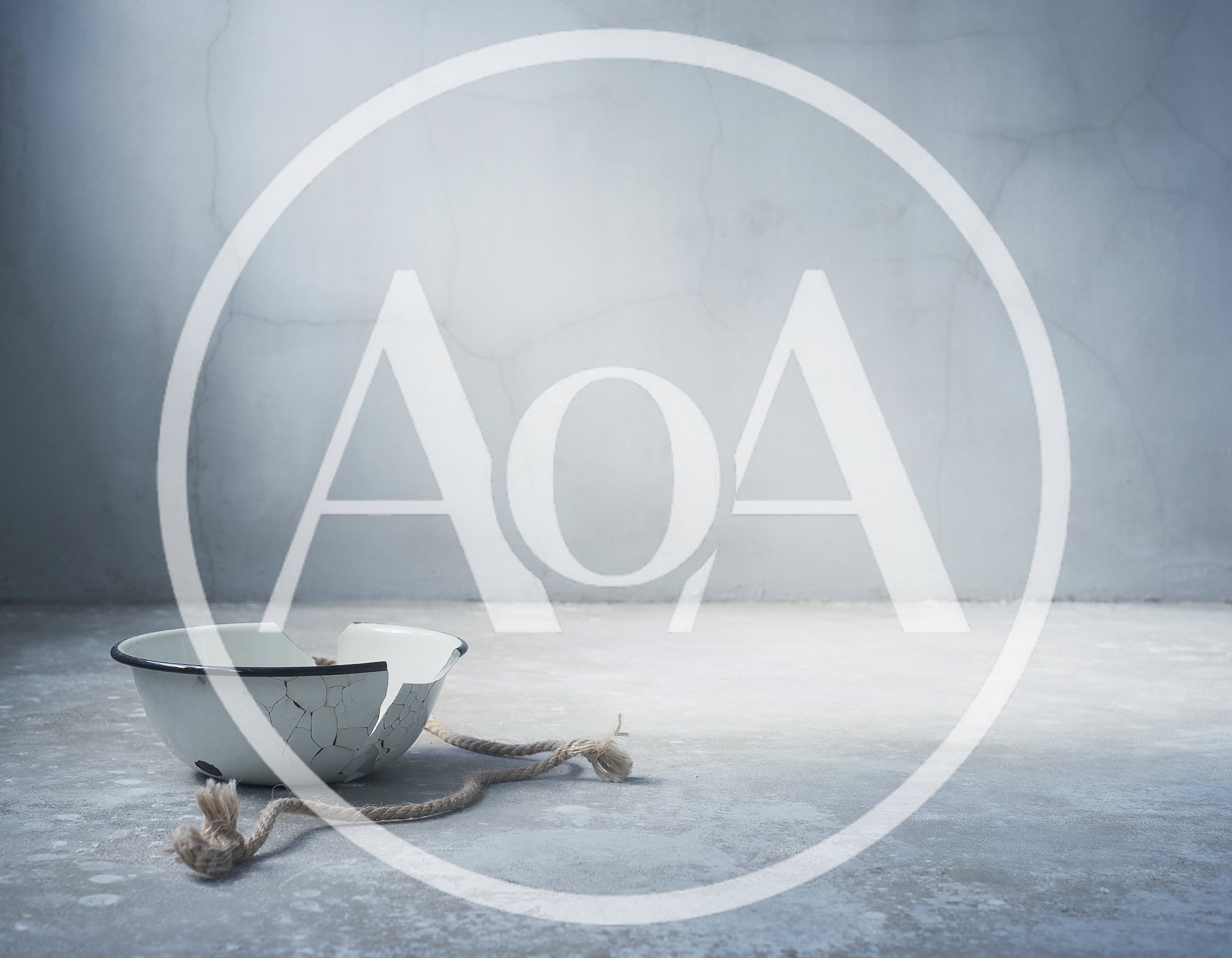 Broken Enamel Bowl With Rope On Concrete Floor