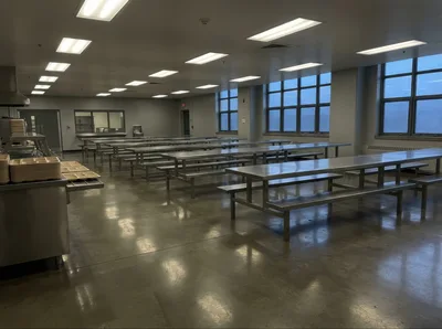 Empty School Cafeteria With Stainless Steel Tables