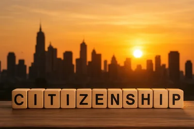 Wooden Blocks Spelling Citizenship Against City Skyline