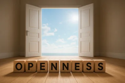 Wooden Blocks Spelling Openness In Front Of Open Door