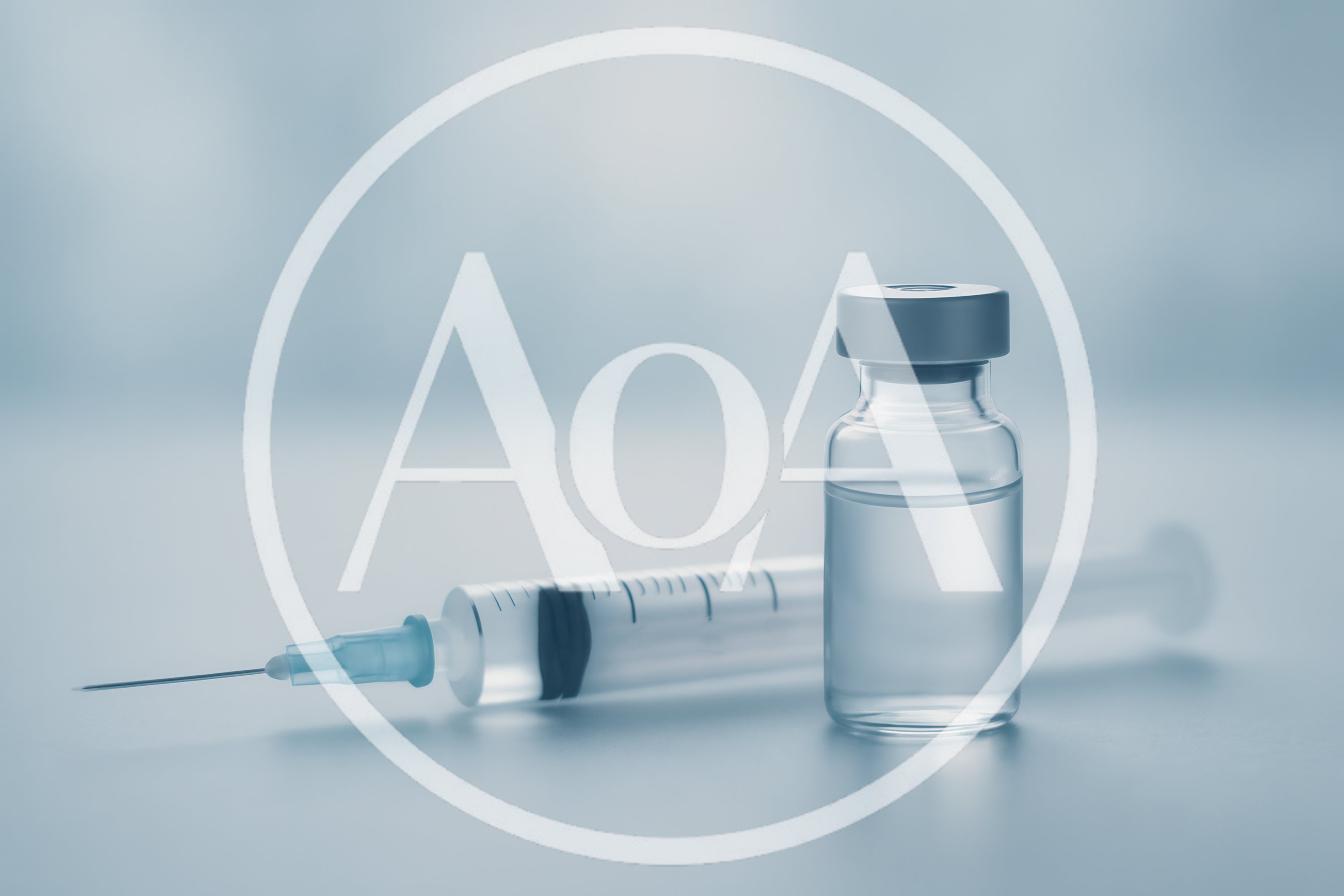 Medical Syringe And Vaccine Vial On Clinical Surface