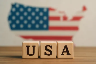 Wooden Blocks Spelling USA With American Flag Map Background