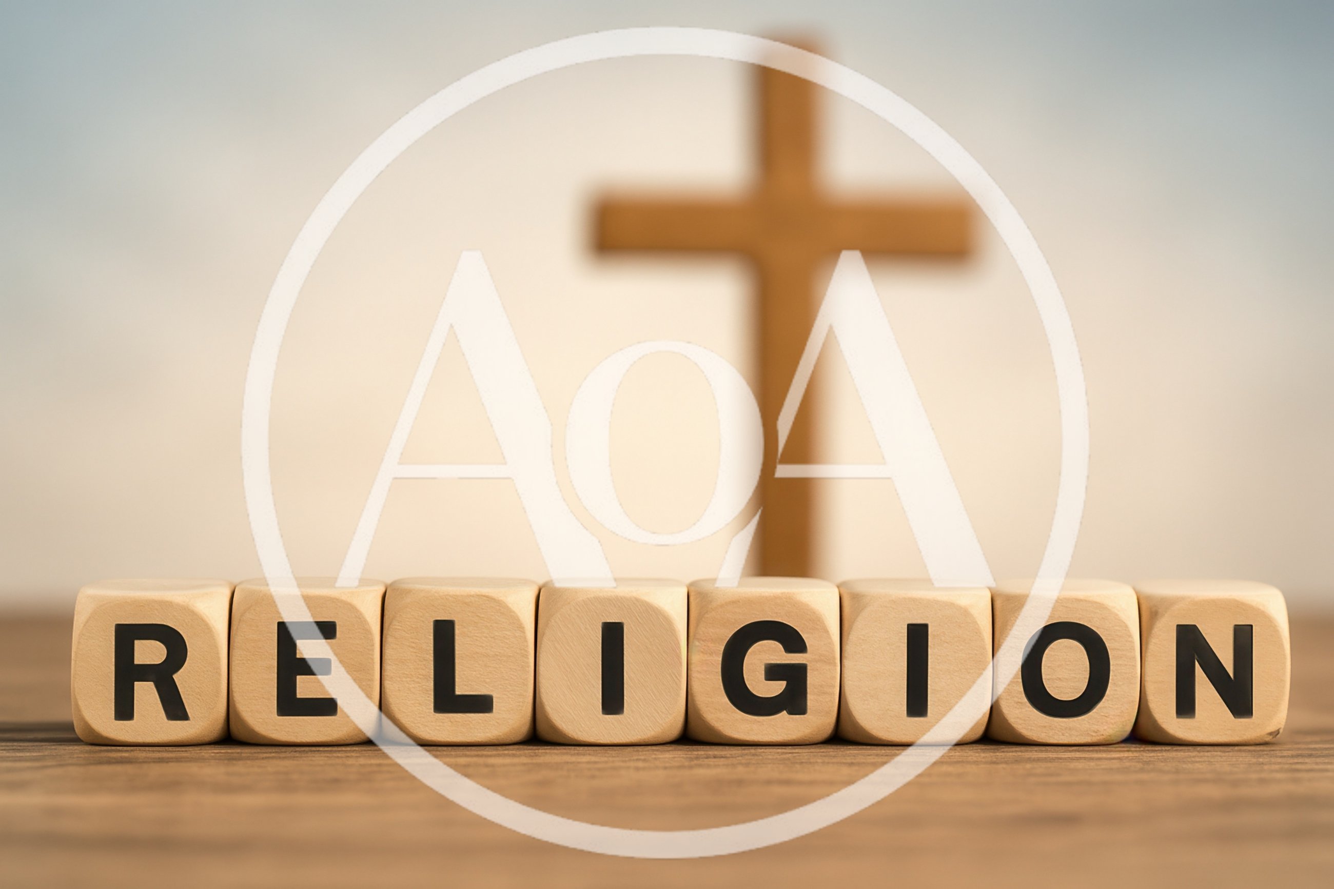 Wooden Blocks Spelling Religion With A Christian Cross