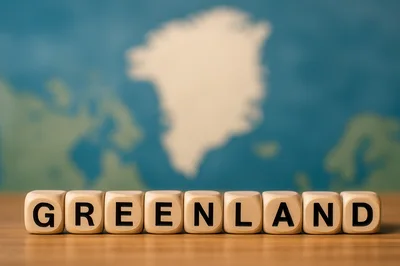 Wooden Alphabet Blocks Spelling Greenland On A Wooden Surface