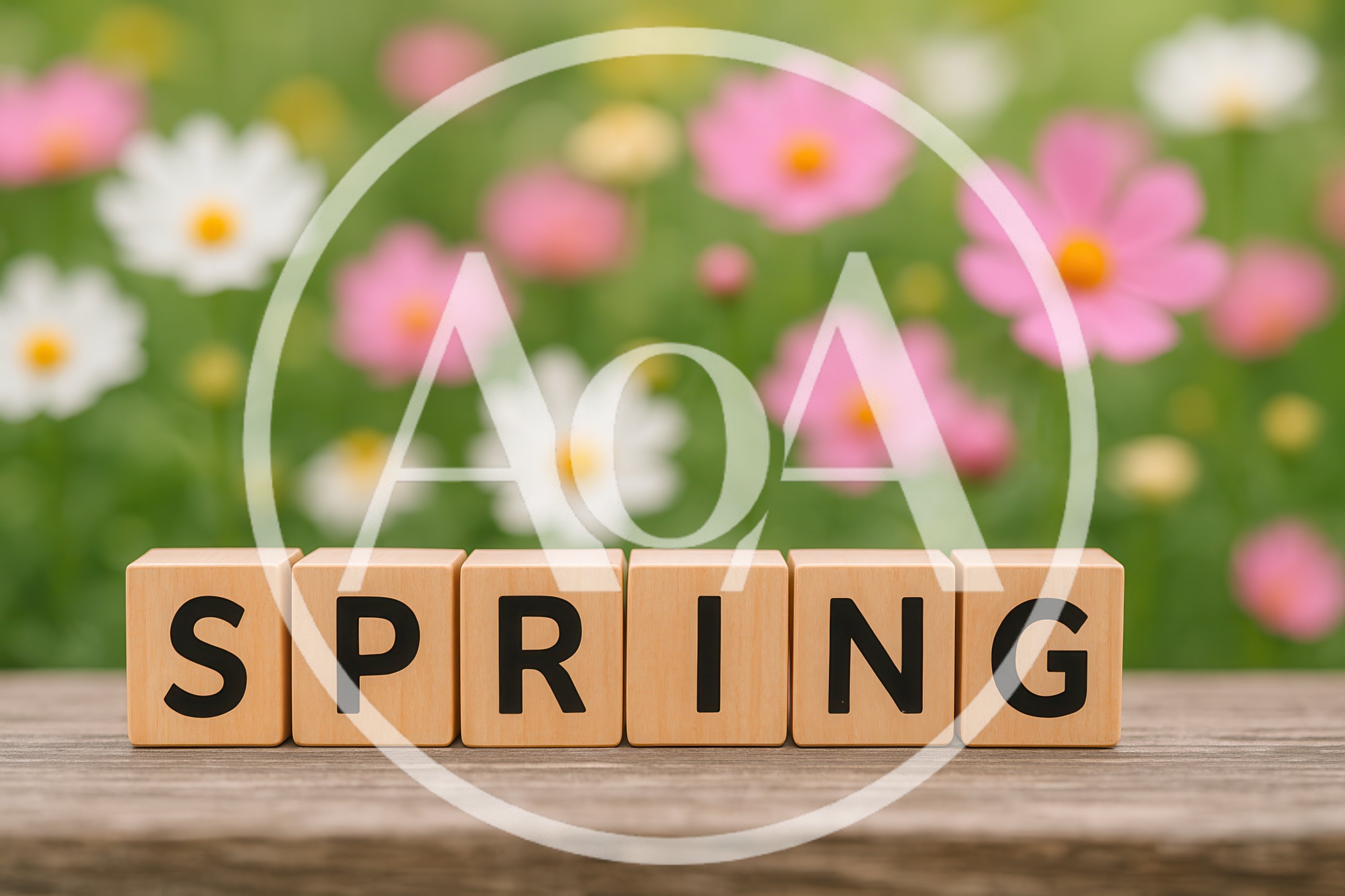 Wooden Blocks Spelling Spring on a Garden Table