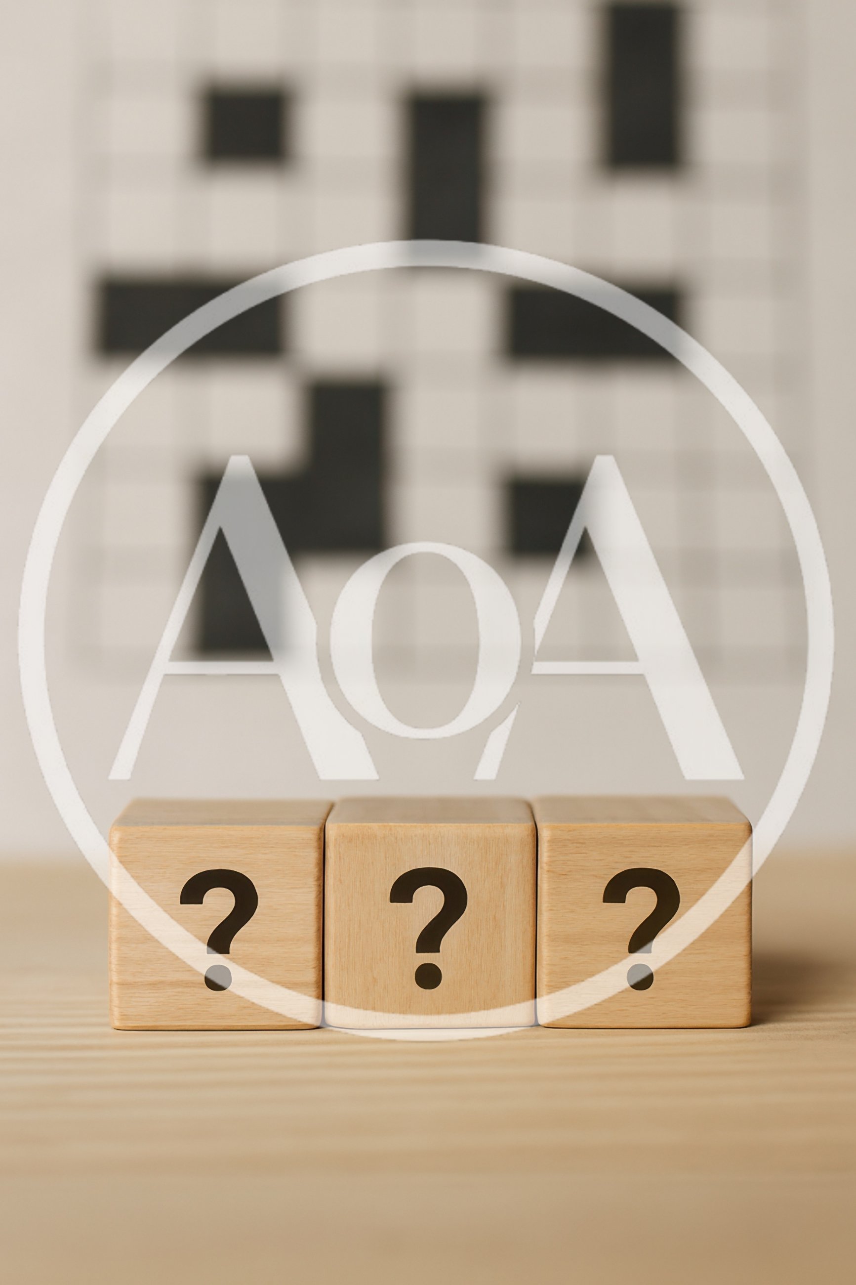 Three Wooden Blocks With Question Marks In Front Of Crossword