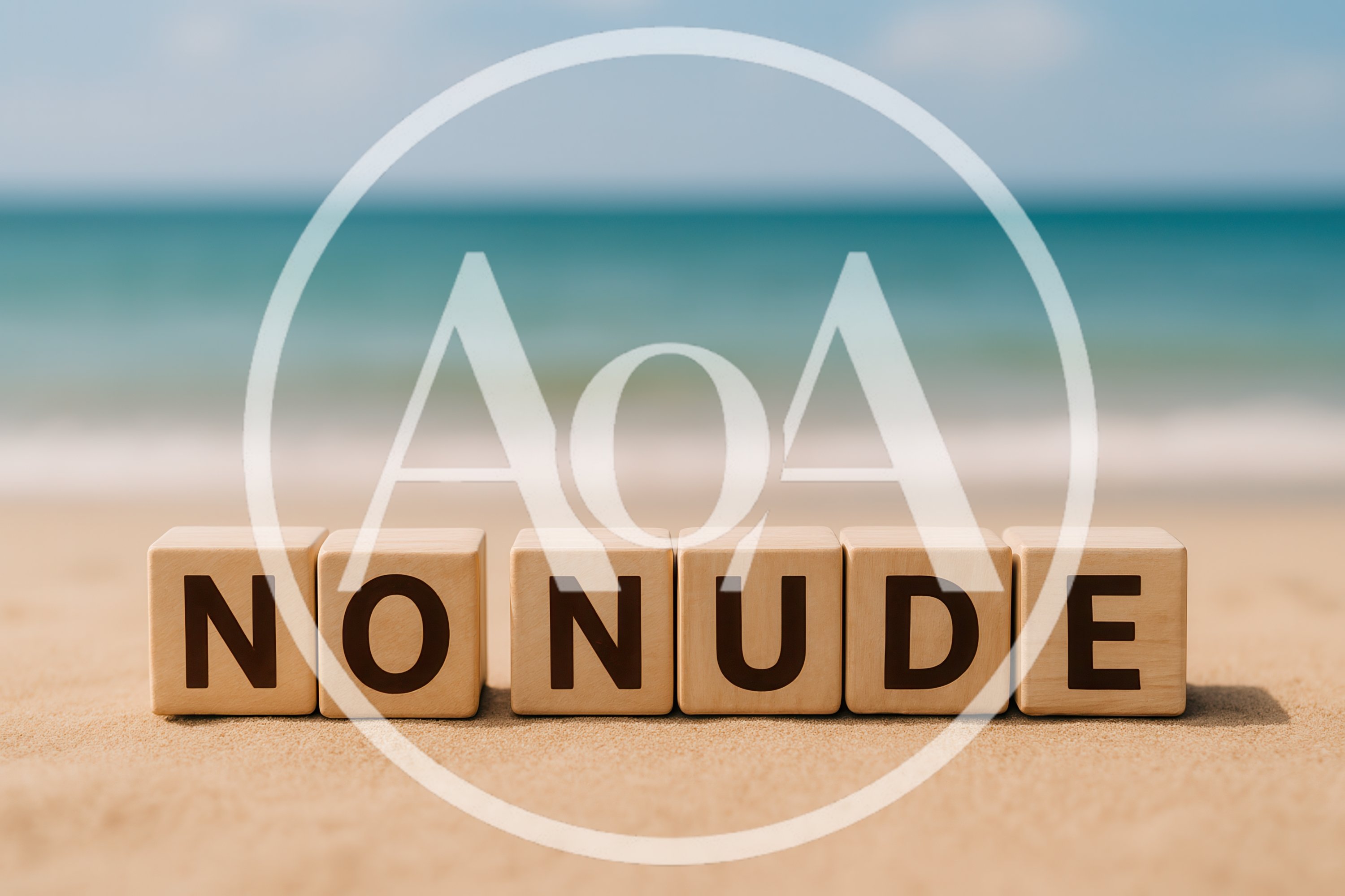 Wooden Blocks Spelling No Nude On Sandy Beach