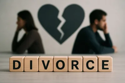 Wooden Blocks Spelling Divorce With Distressed Couple In Background