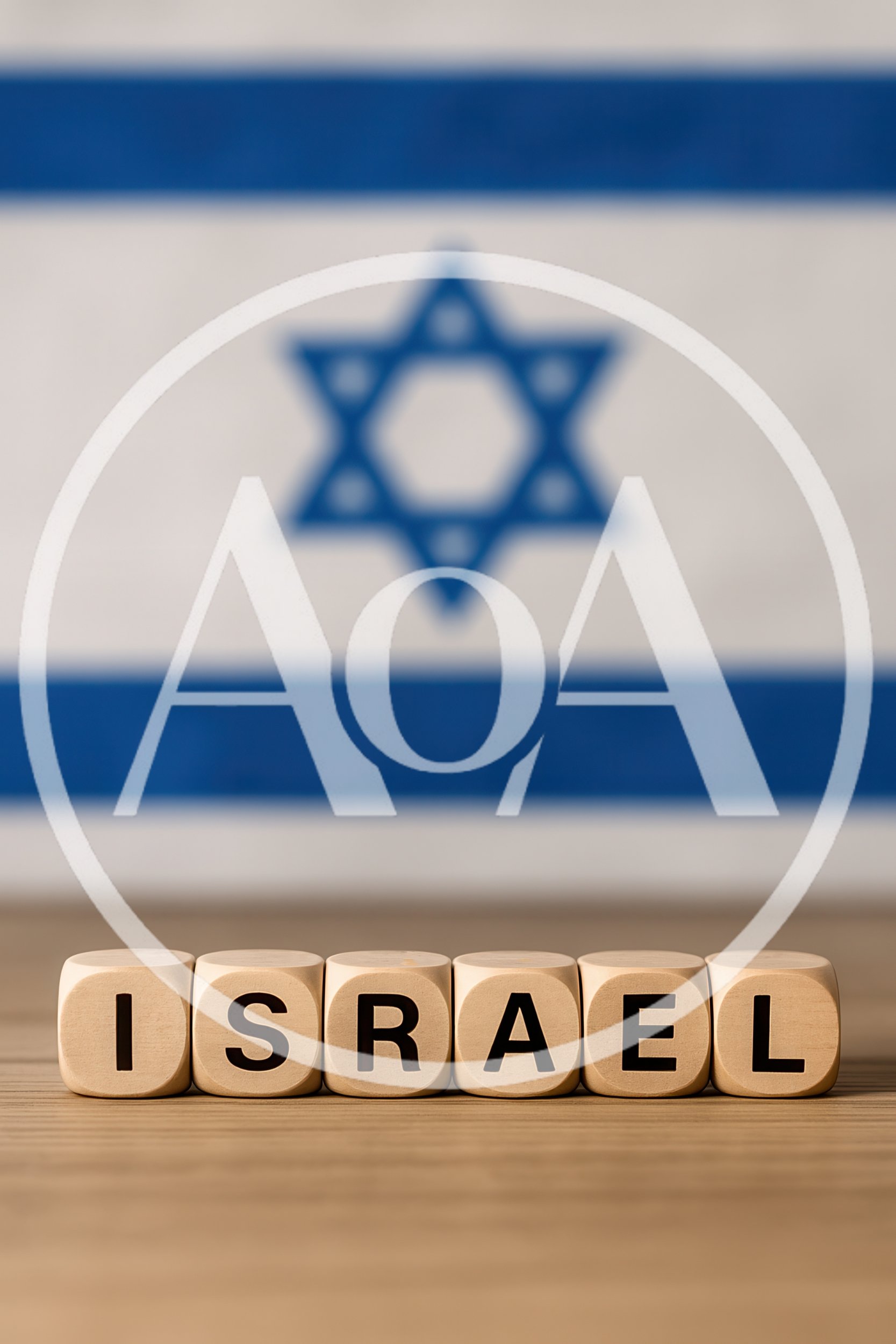 Wooden Blocks Spelling Israel In Front Of Israeli Flag