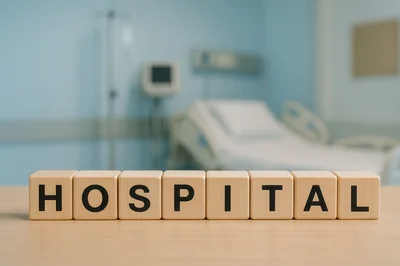 Wooden Blocks Spelling Hospital On A Table
