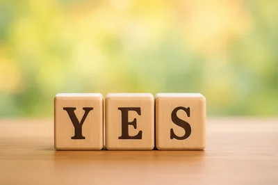 Wooden Blocks Spelling The Word Yes
