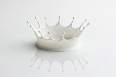 Milk Splash Crown Shape On White Background