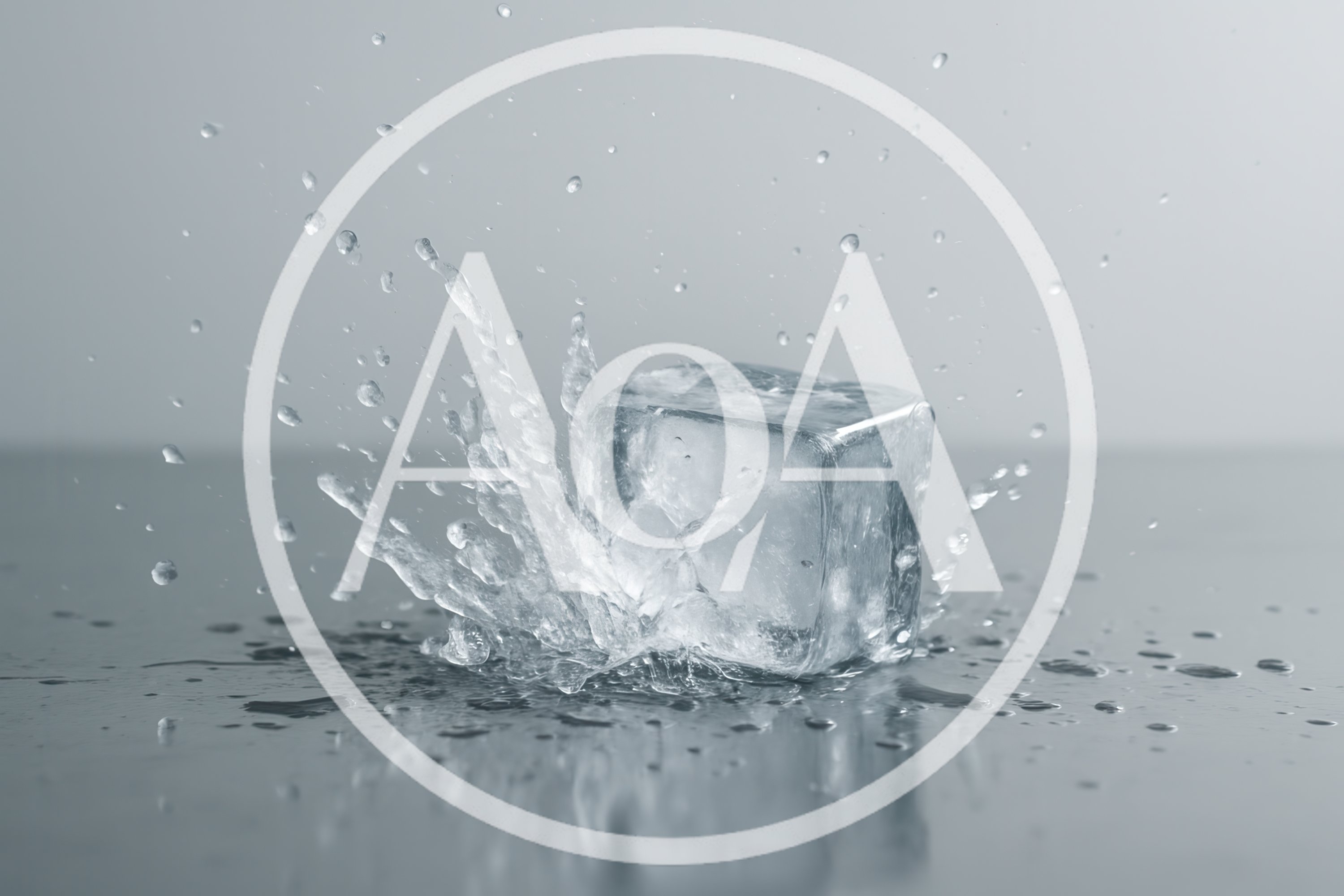 Ice Cube Dropping Into Water Creating Splash