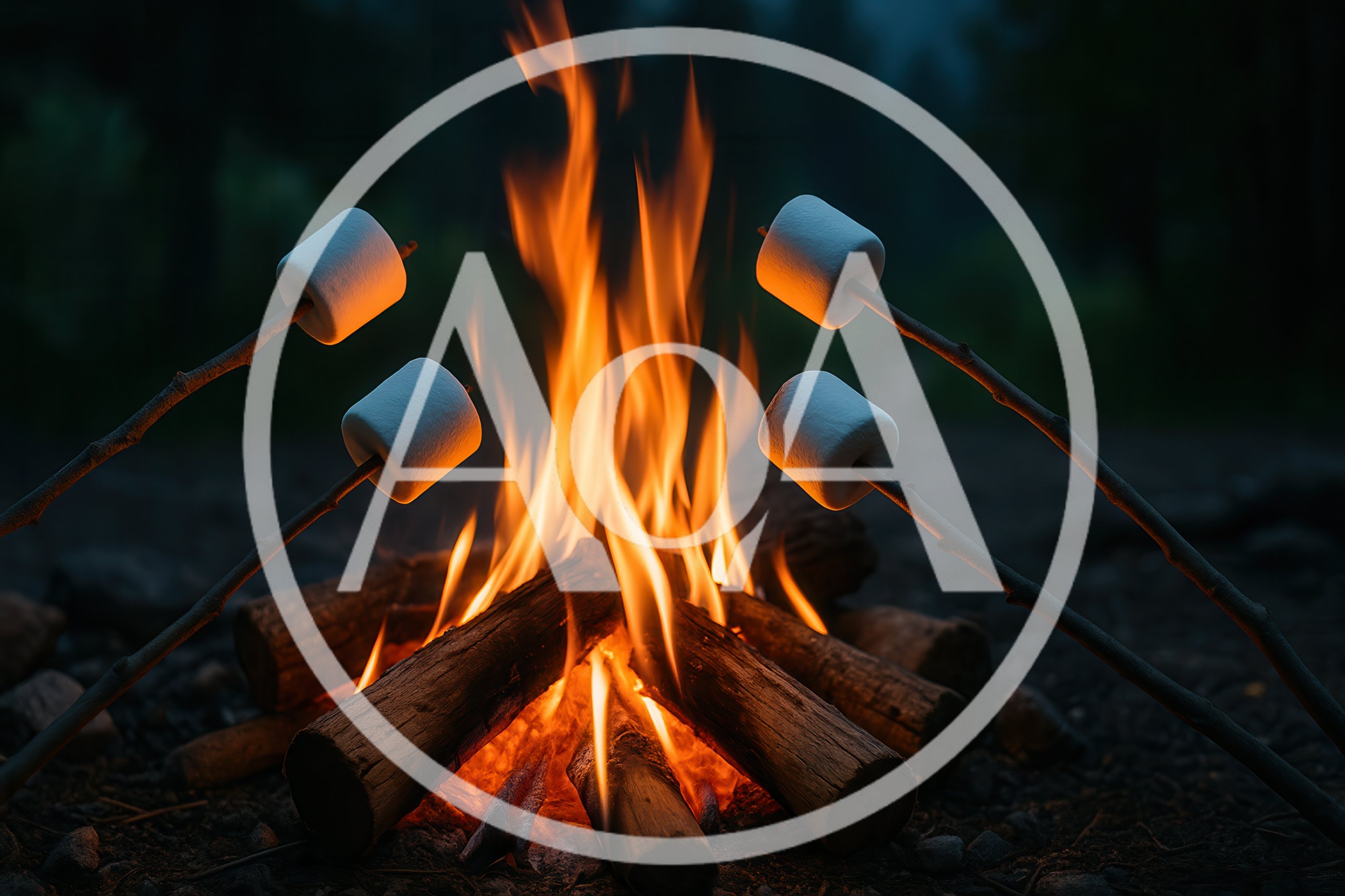 Four Marshmallows Roasting Over A Campfire At Night