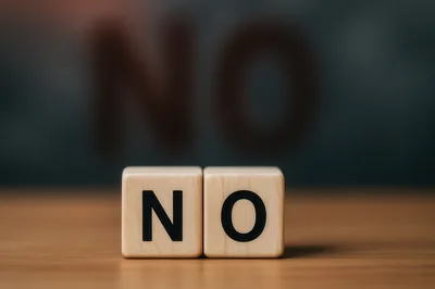 Wooden Blocks Spelling The Word No On A Table