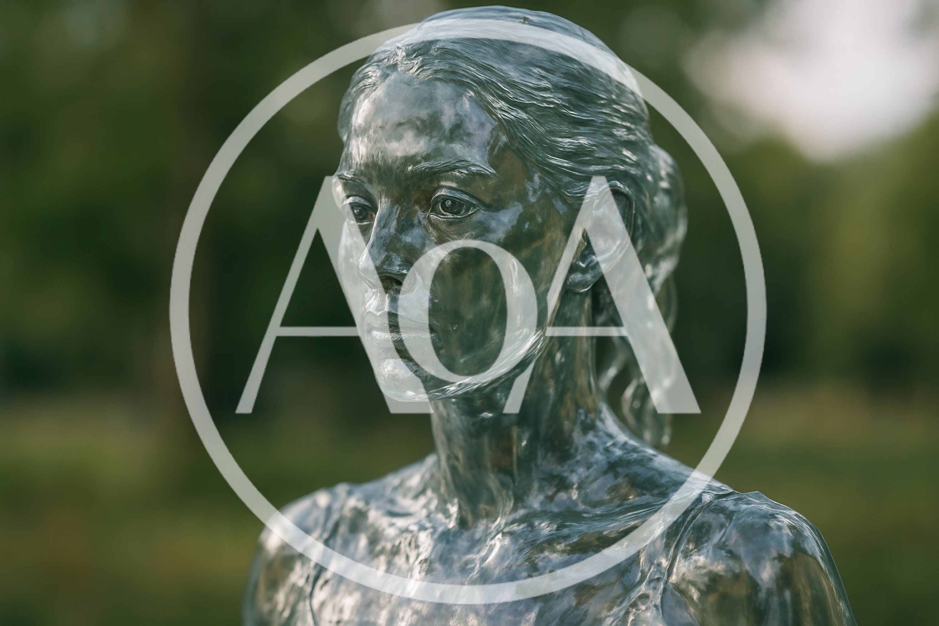 Bronze Sculpture Of A Woman In A Park
