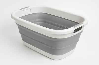 Collapsible Plastic Laundry Basket On White Background