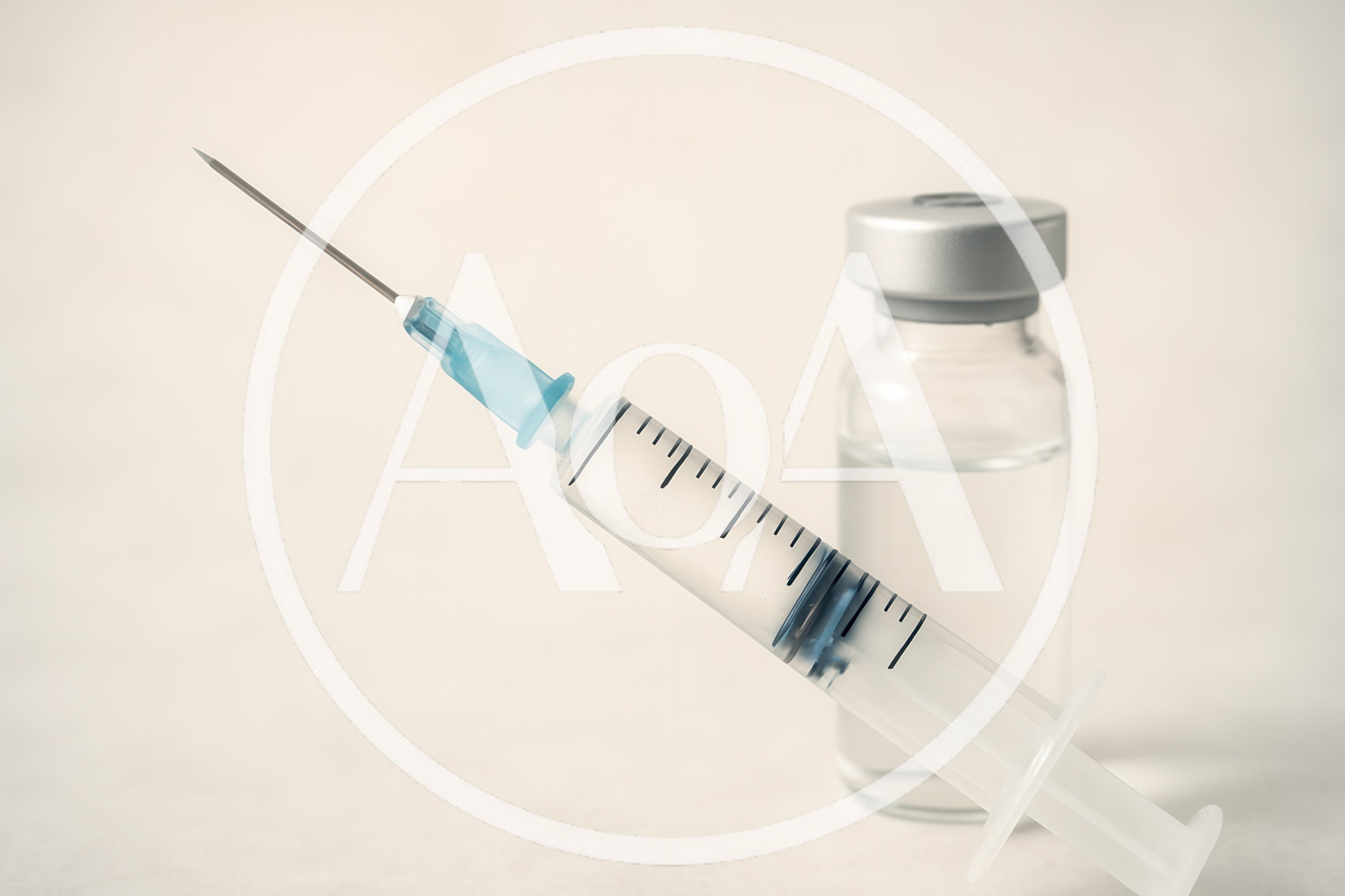 Medical Syringe And Glass Vial On White Background