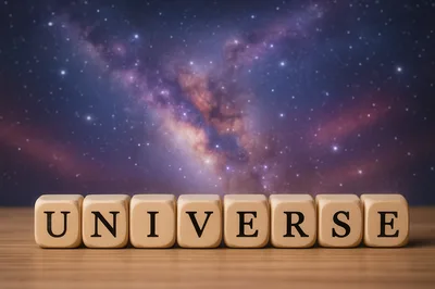 Wooden Blocks Spelling Universe Against A Starry Galaxy Background