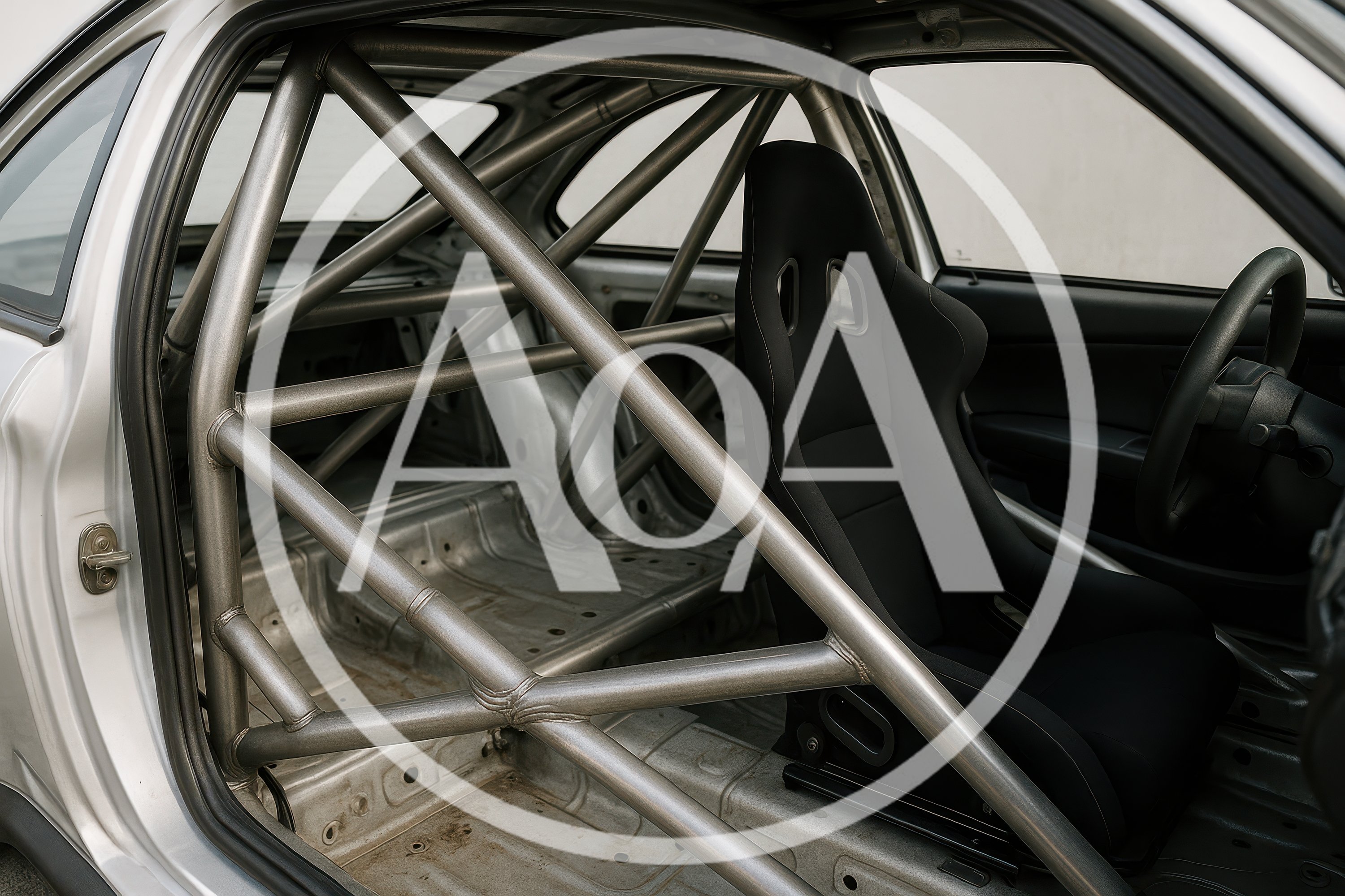 Interior View Of A Stripped Race Car With Roll Cage