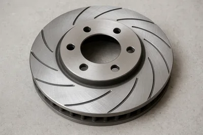 High Performance Slotted Brake Rotor On Concrete Surface