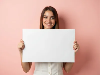 Smiling Young Woman Holding Blank White Sign