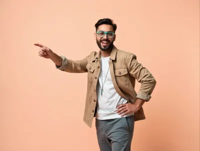 Happy Young Man Pointing To The Side