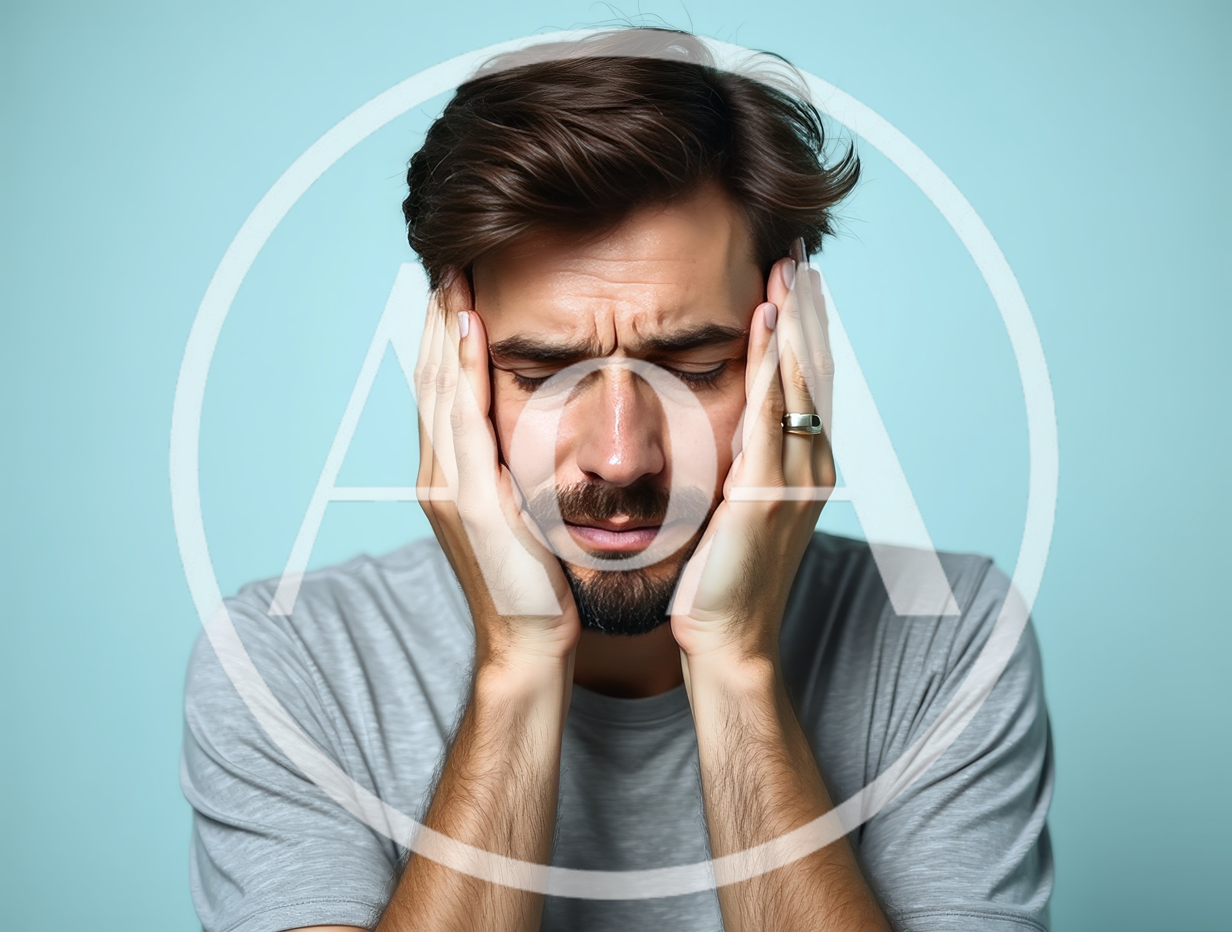 Stressed Man Holding Head In Hands