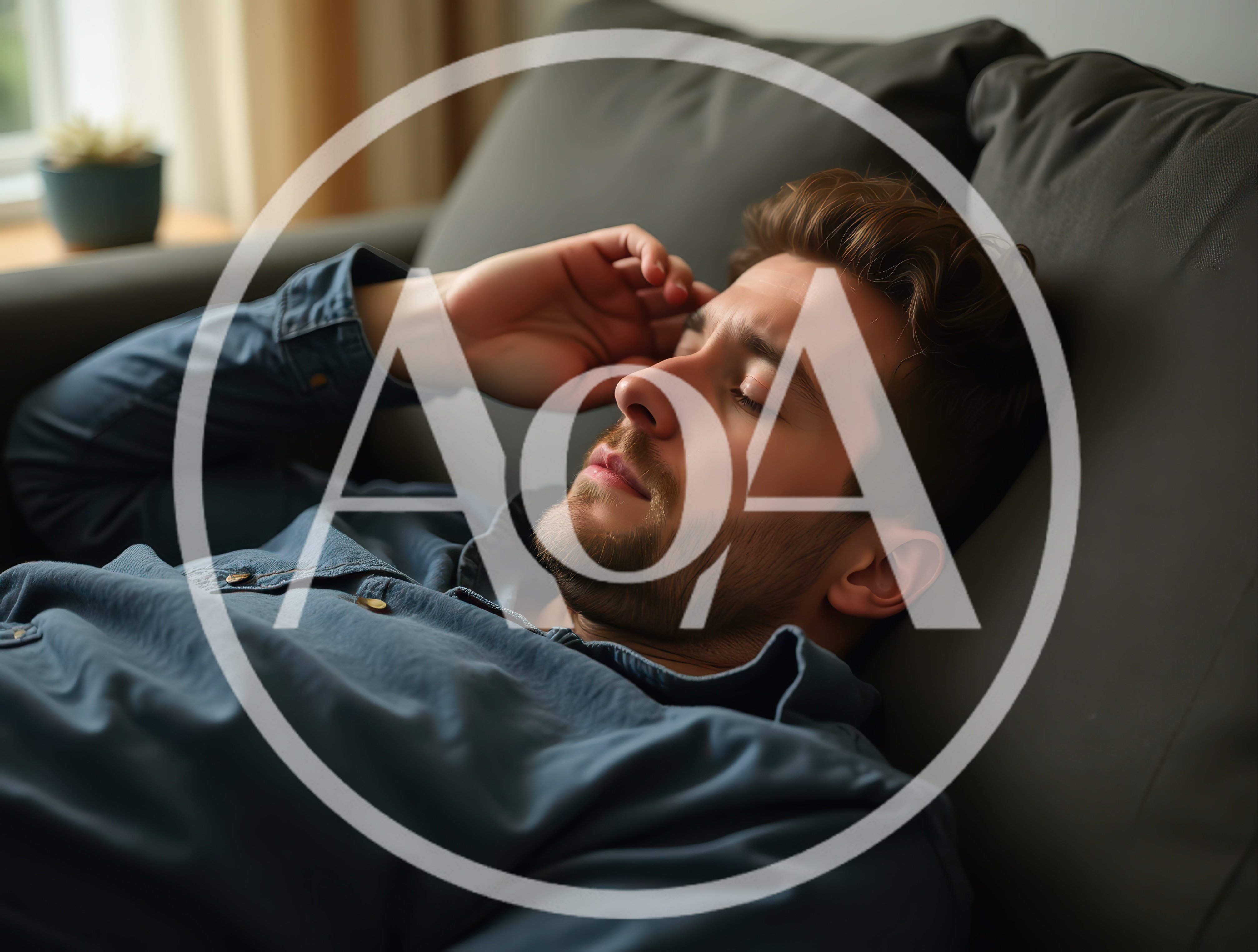 Young Man Resting On A Sofa