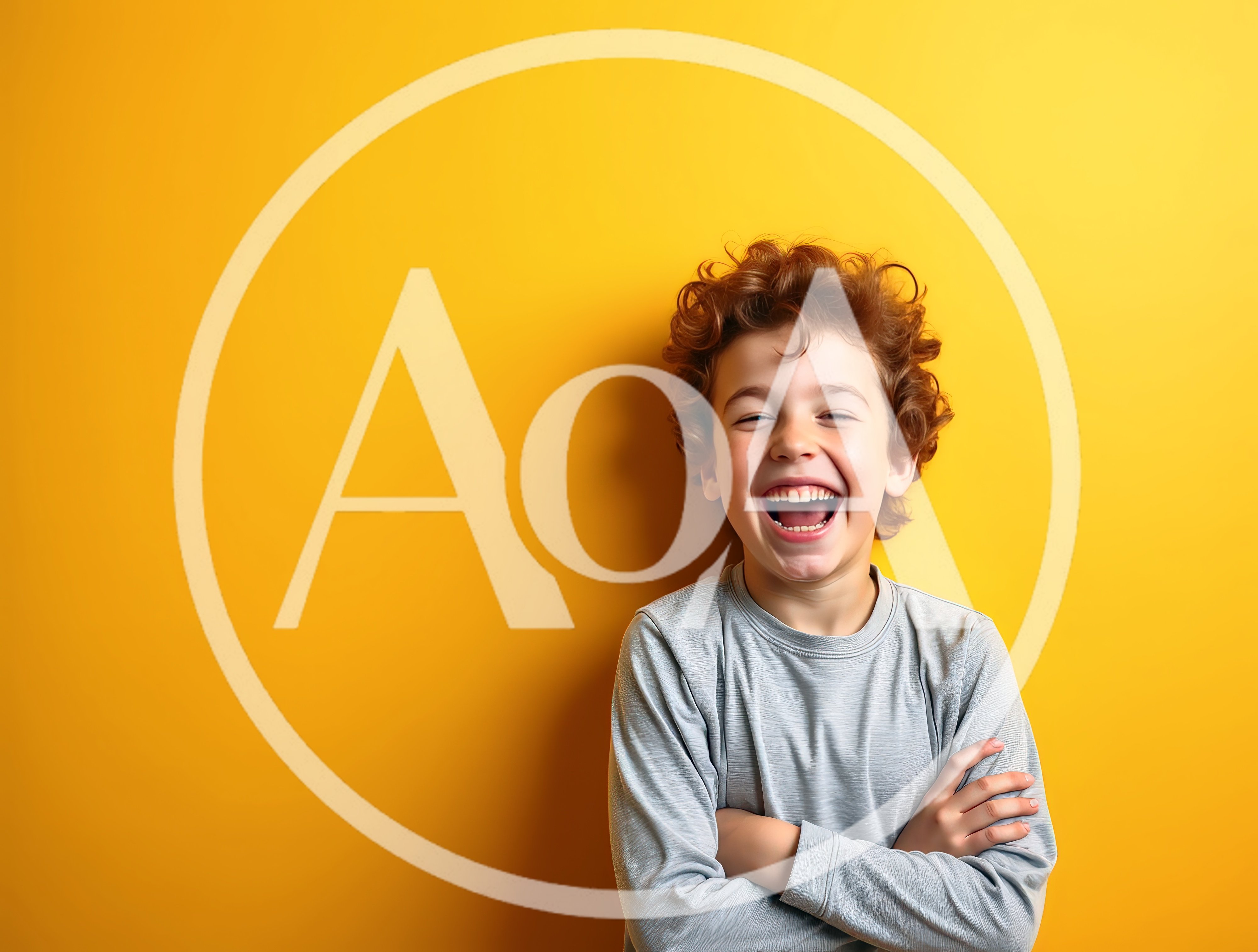 Happy Young Boy Laughing Against Yellow Background