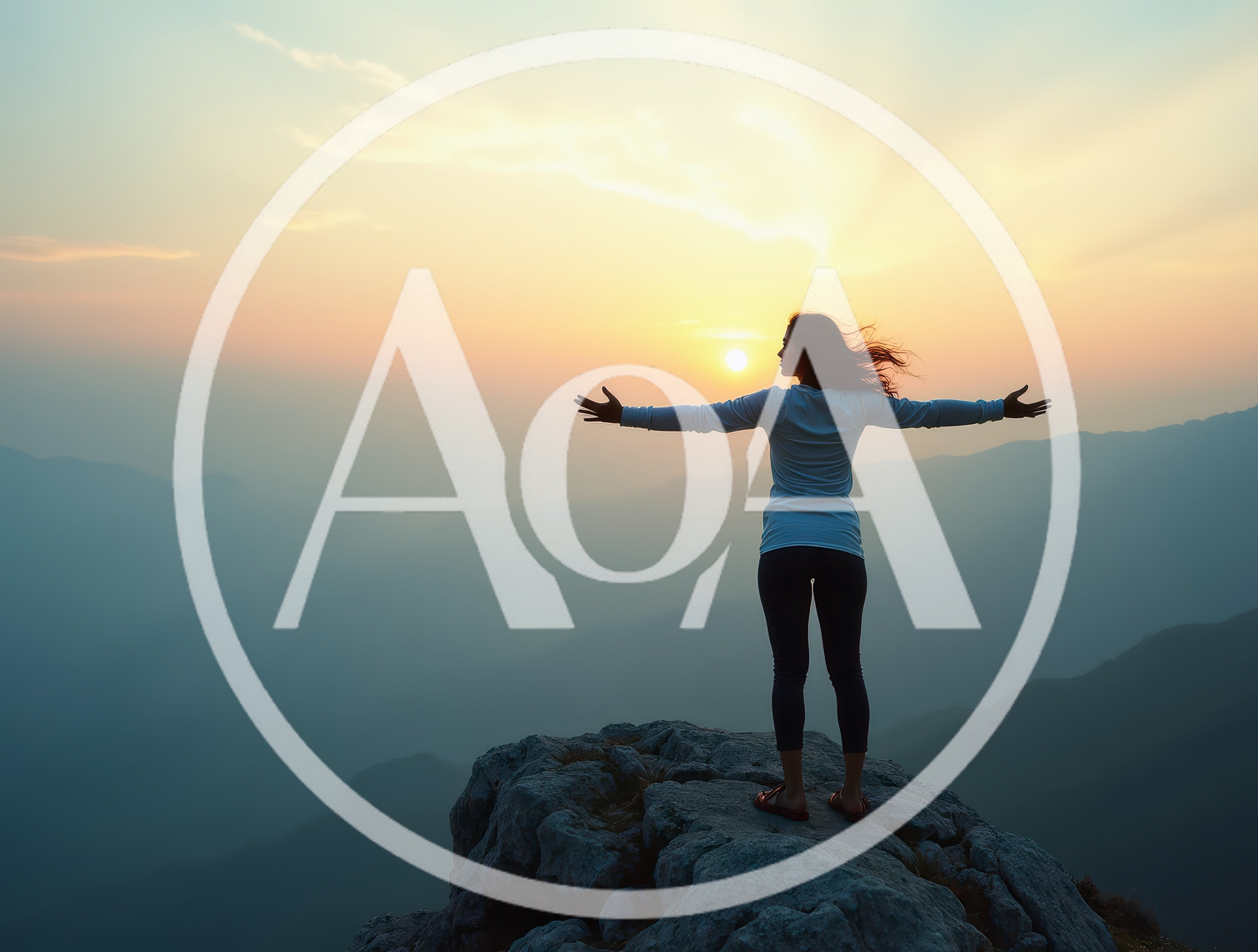 Woman Standing With Arms Outstretched On Mountain Peak