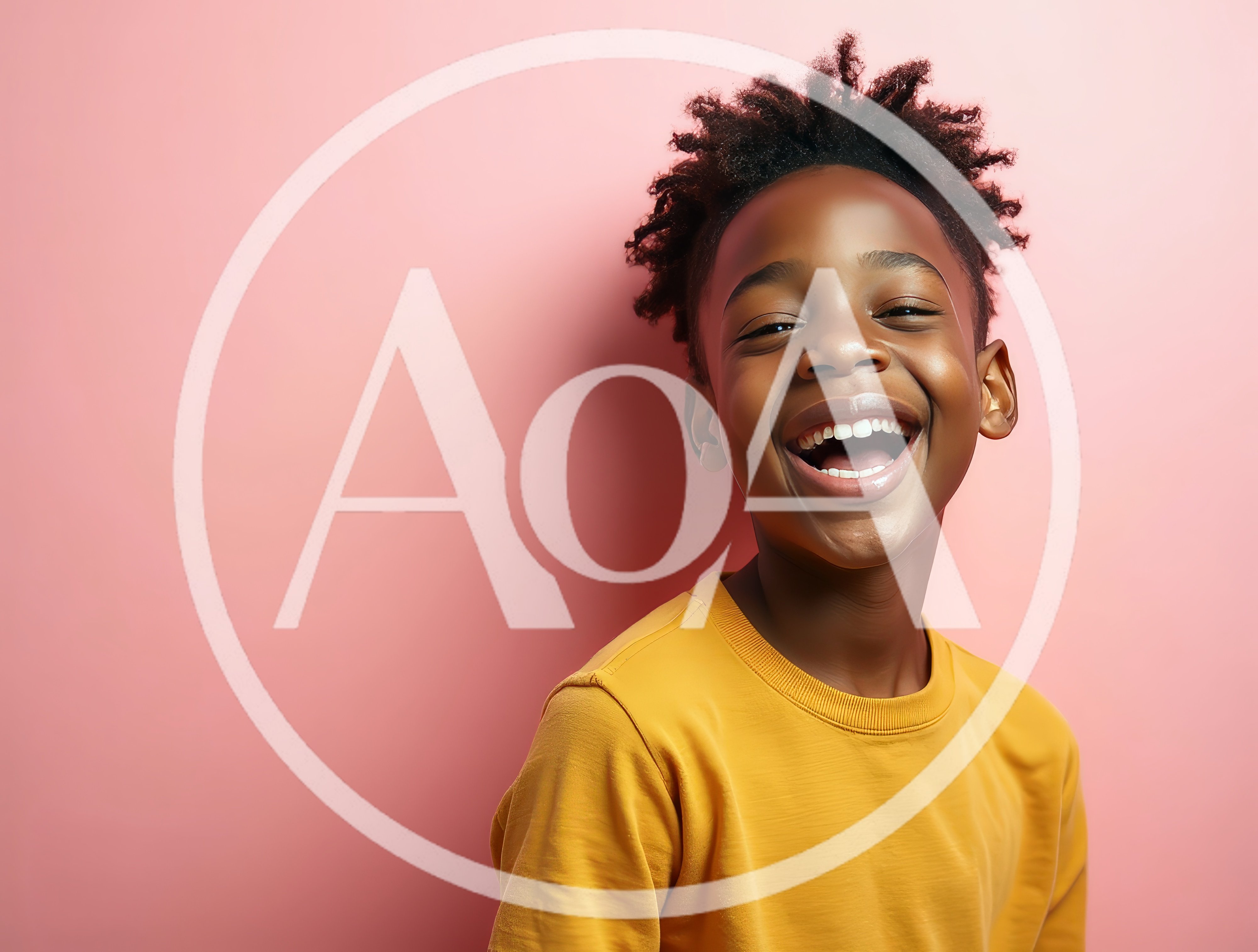 Happy Young Boy Laughing Against Pink Background