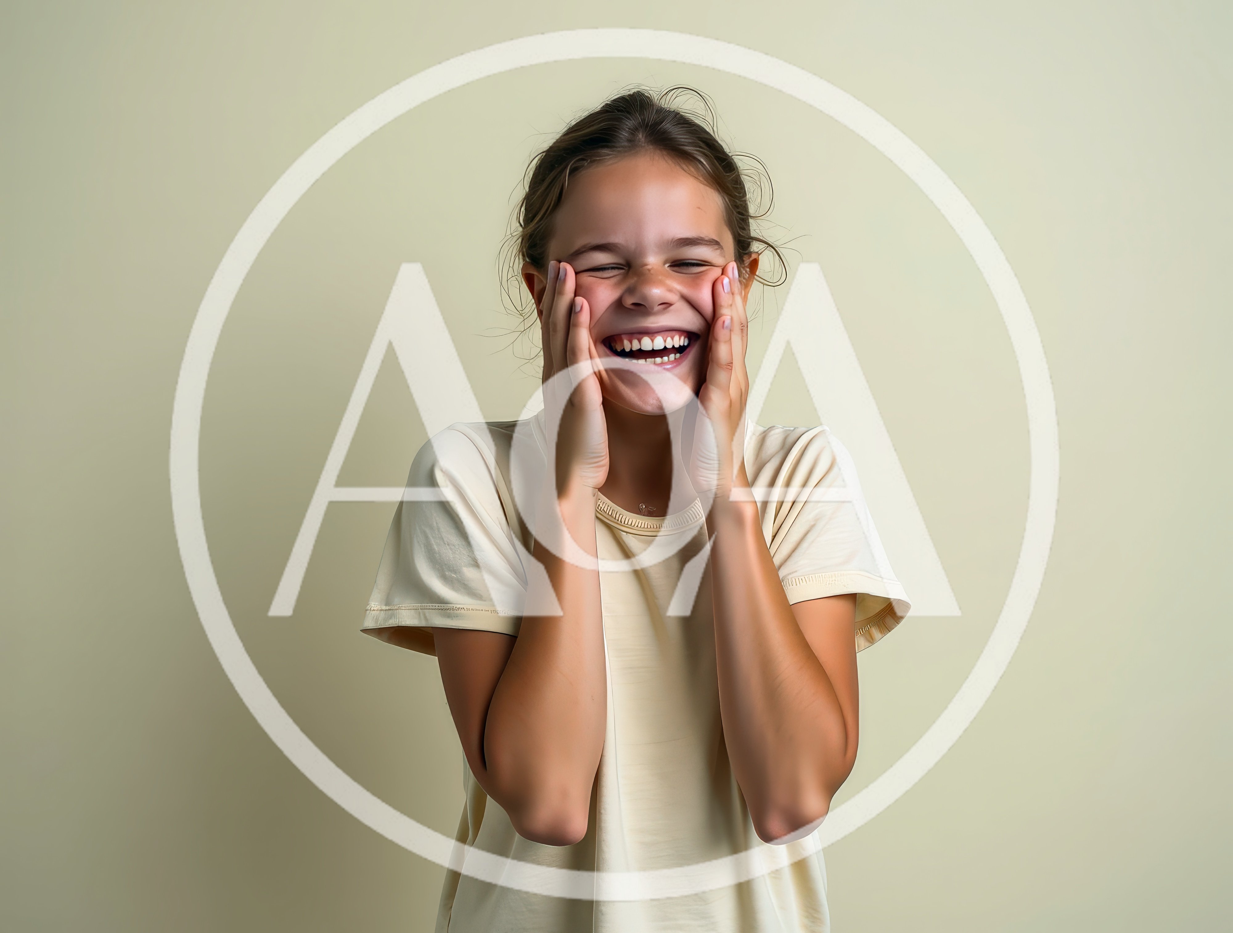 Young Girl Laughing With Hands On Her Cheeks