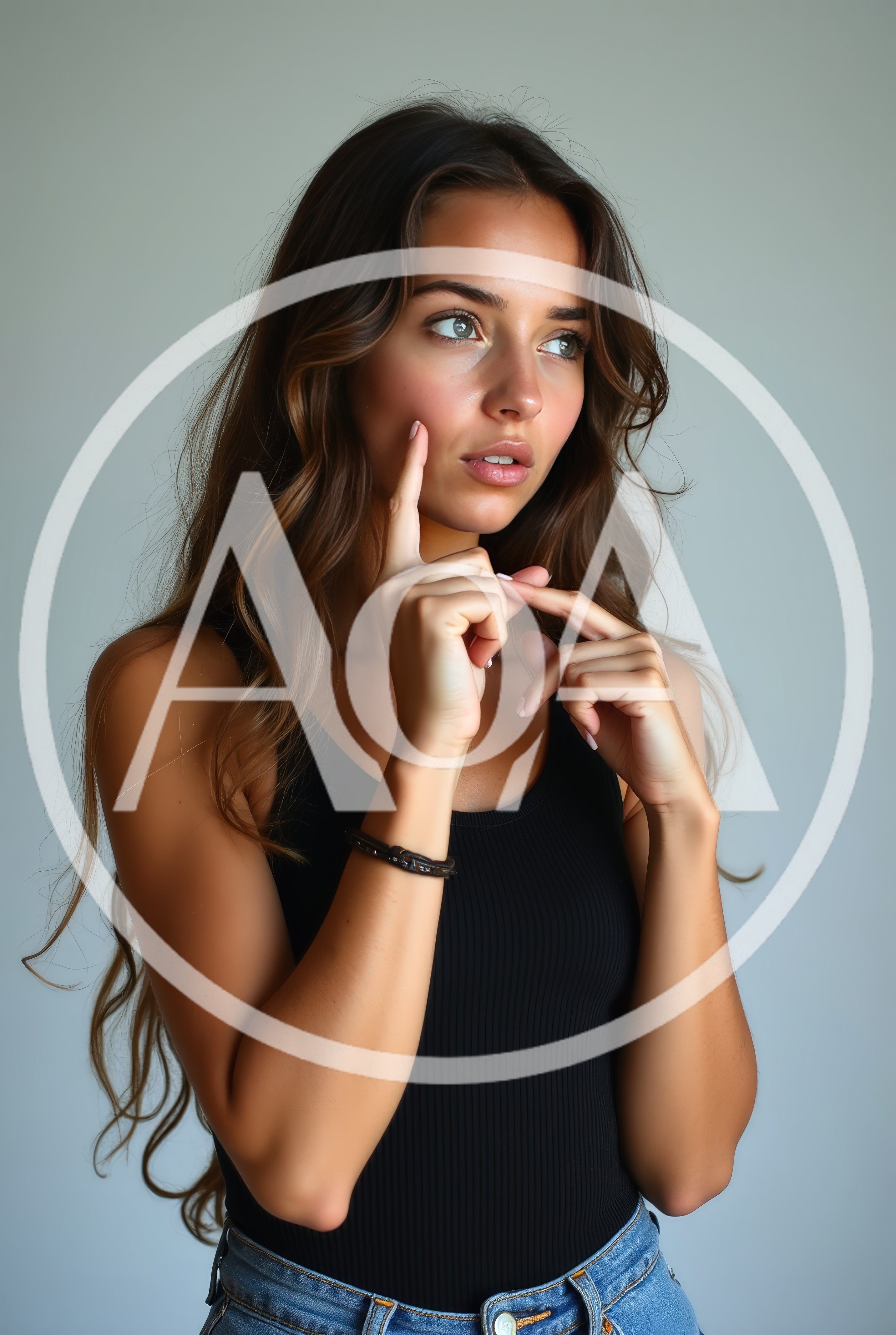 Thoughtful Young Woman Posing With Hand On Chin