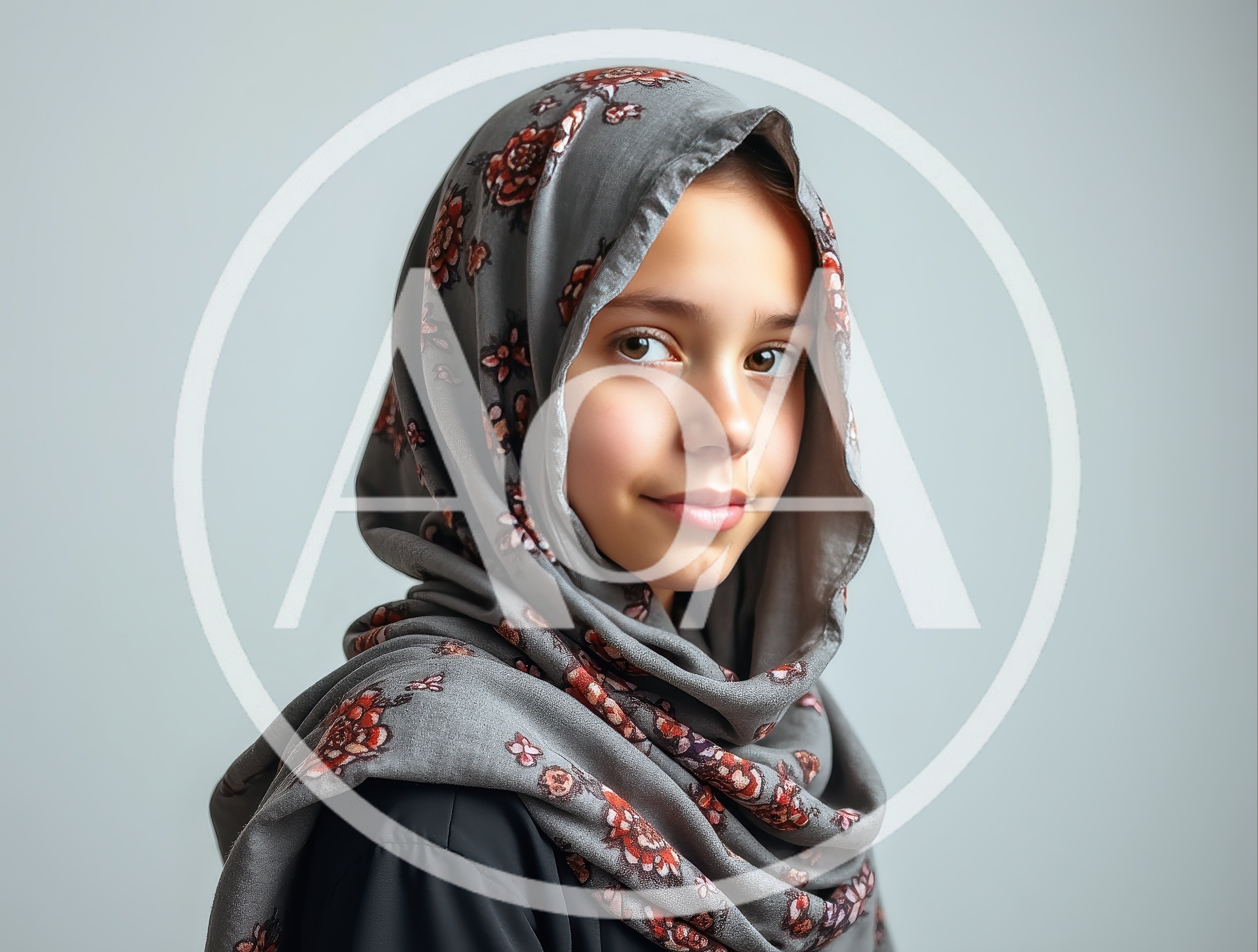 Portrait Of A Young Girl Wearing A Floral Hijab