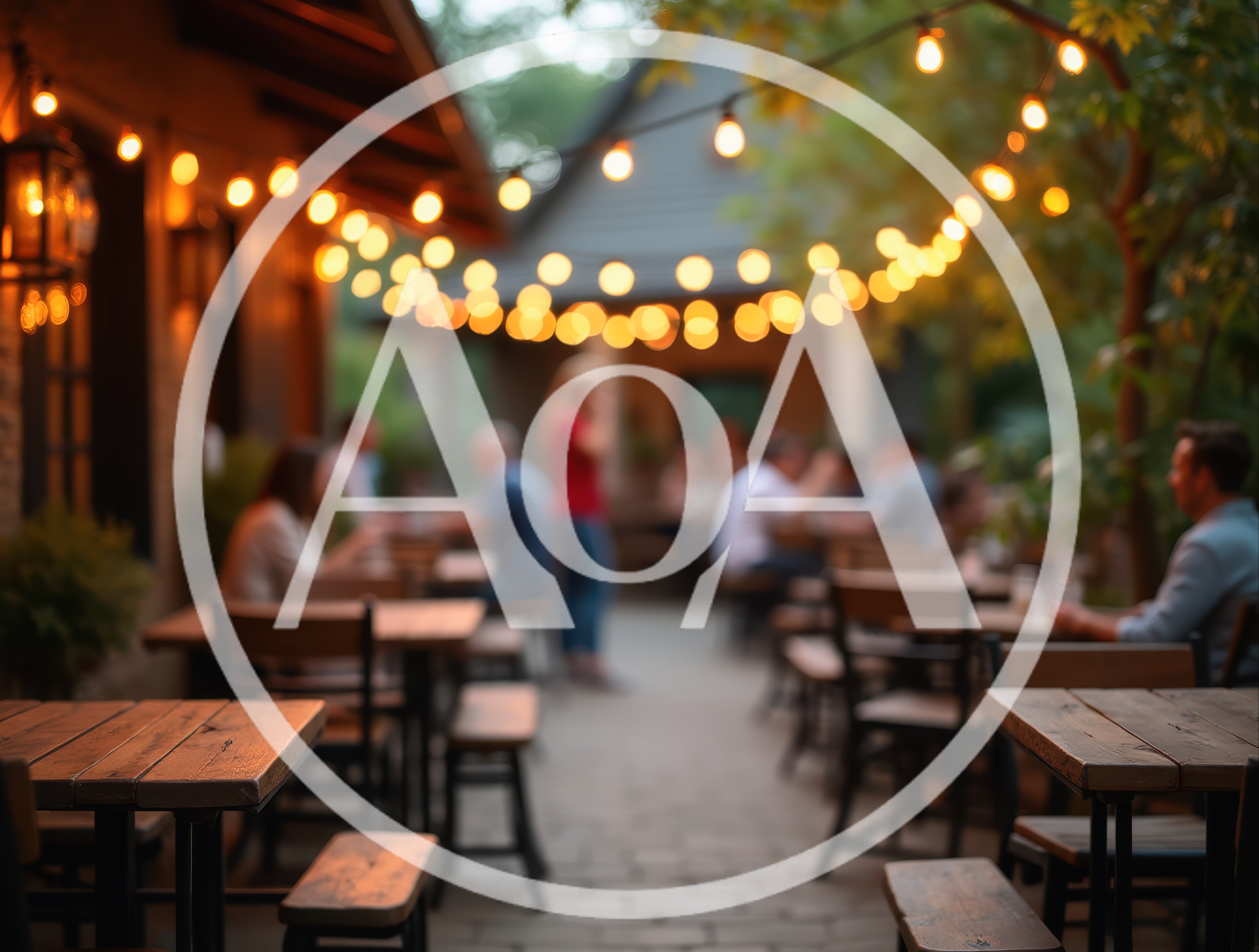 Outdoor Restaurant Patio With String Lights At Dusk