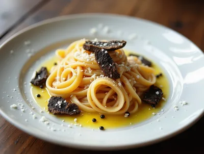 Gourmet Pasta Dish With Truffle Slices And Parmesan