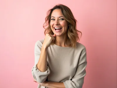 Happy Woman Smiling Against Pink Background