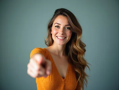 Smiling Woman Pointing Directly At The Camera