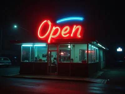 Diner Exterior With Neon Open Sign At Night