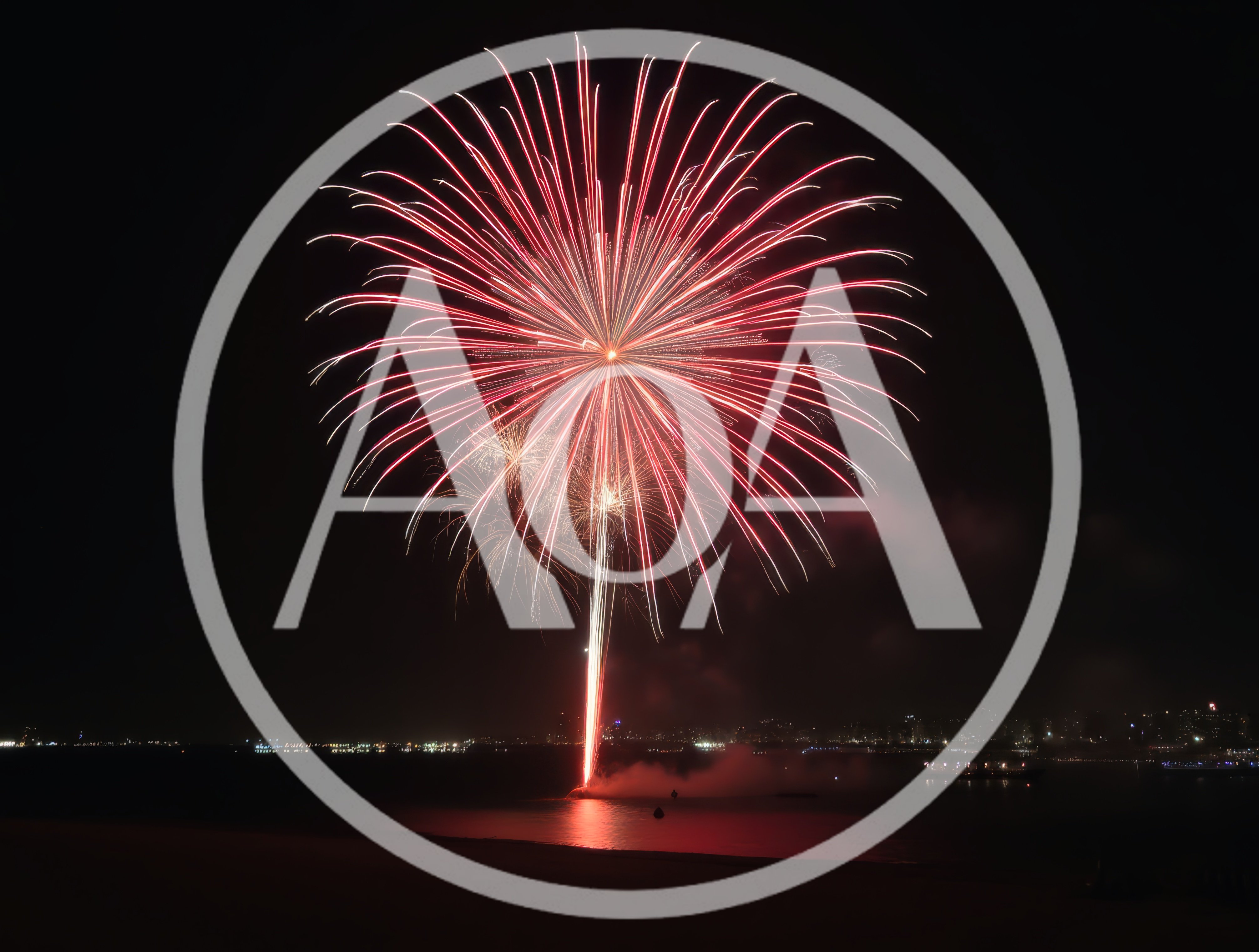 Large Red Fireworks Bursting Over Dark Water