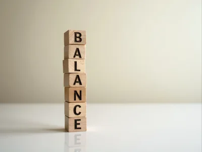 Wooden Blocks Stacked To Spell The Word Balance