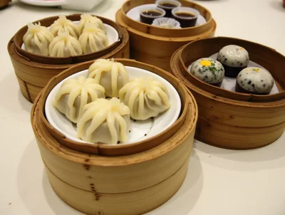 Assorted Dim Sum Served In Bamboo Steamers