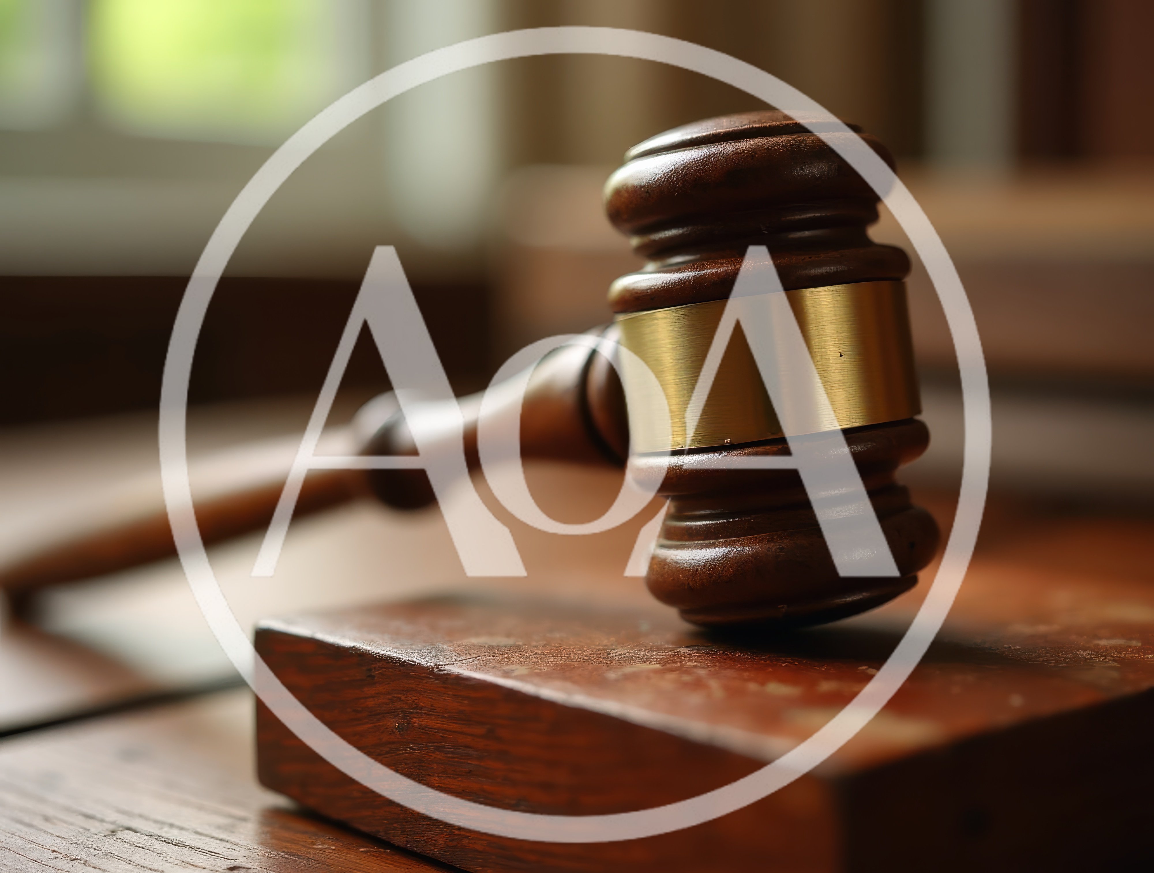 Wooden Gavel Resting On A Courtroom Sound Block