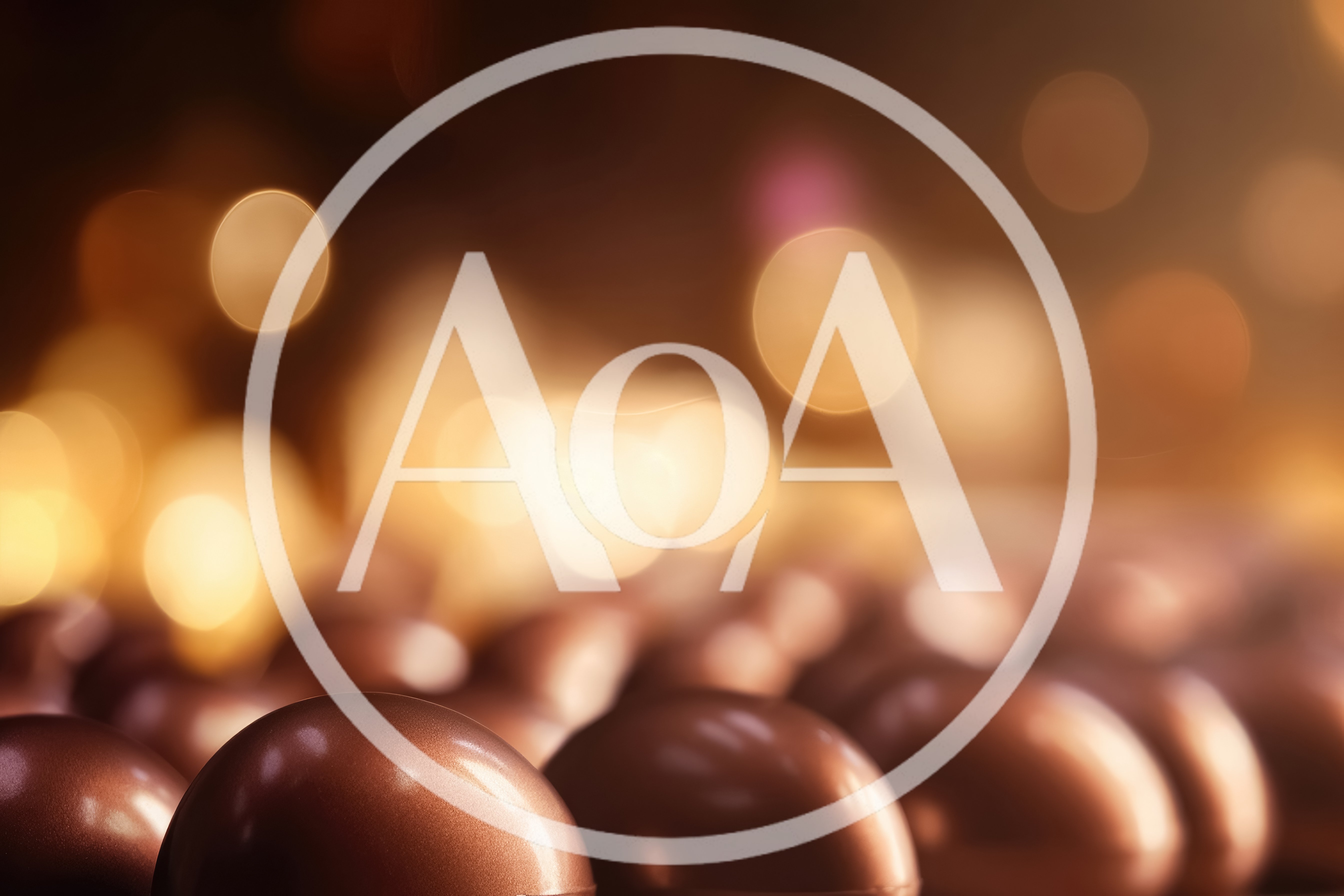 Close Up Of Shiny Bronze Spheres With Bokeh Background
