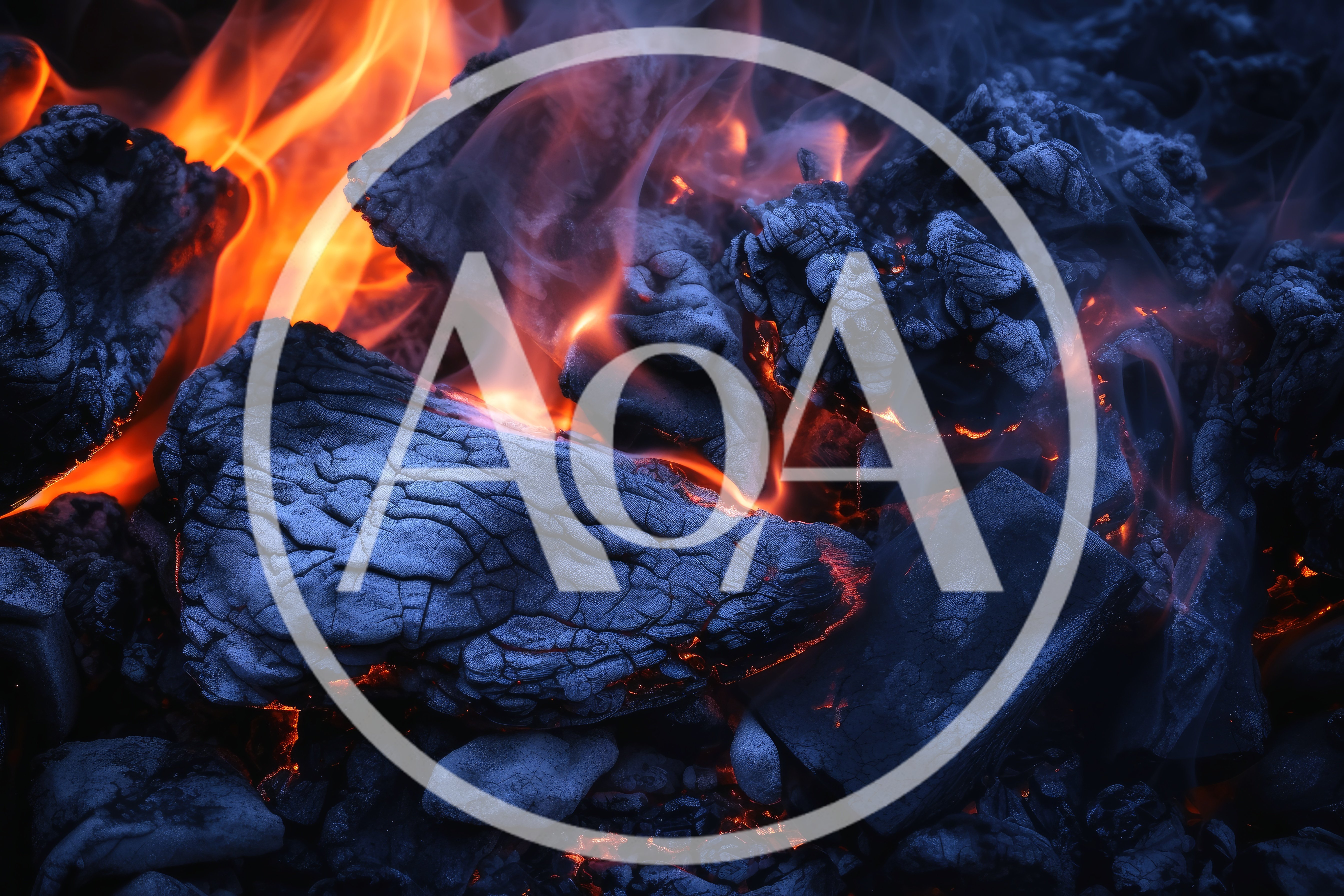 Glowing Embers And Flames In A Charcoal Fire