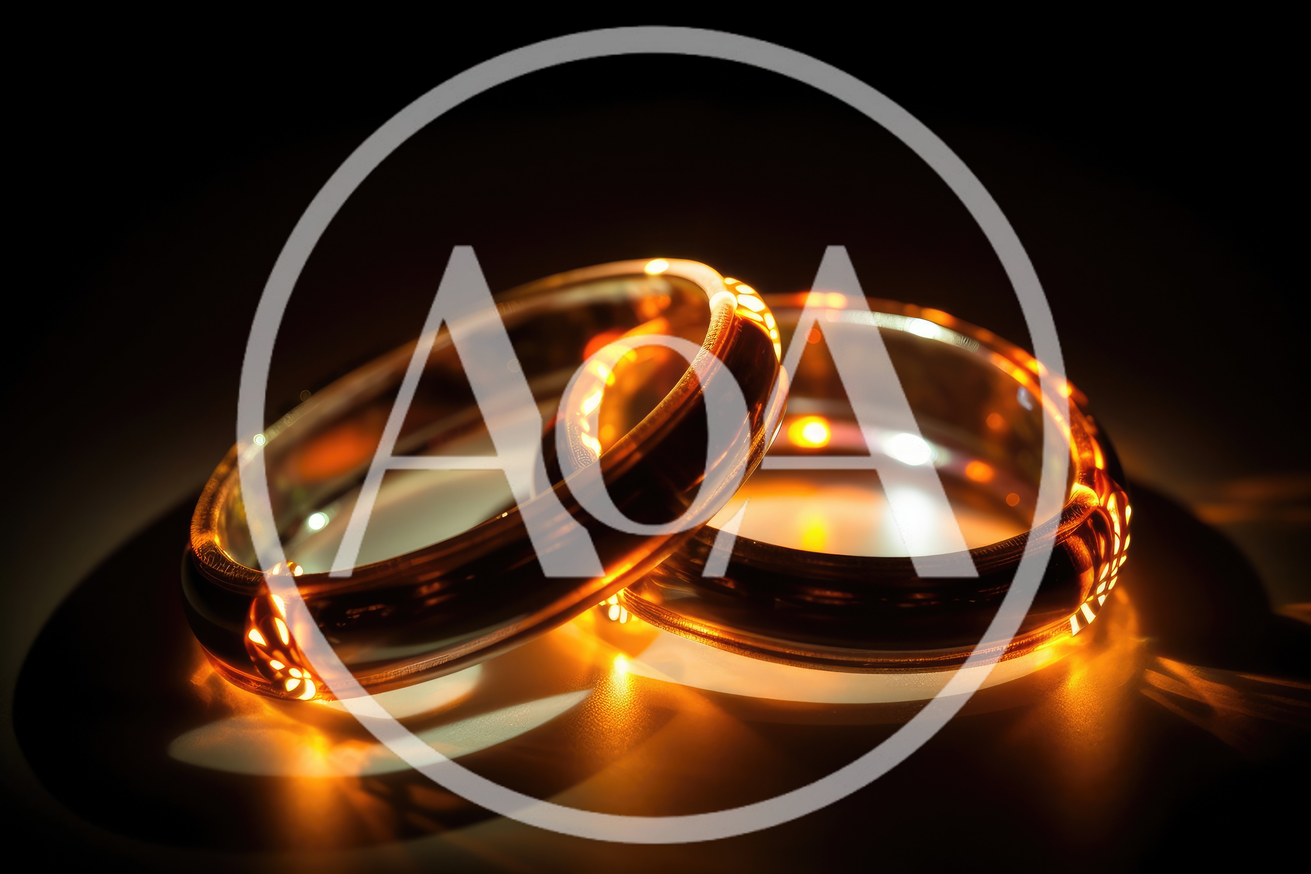 Two Interlocking Gold Wedding Rings With Glowing Light Effects