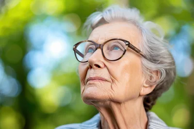 Portrait Of An Elderly Woman Looking Upwards